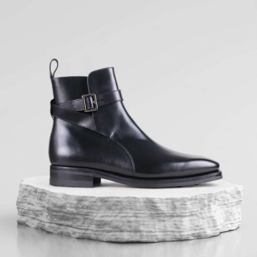 Leather jodhpur boots with buckled strap