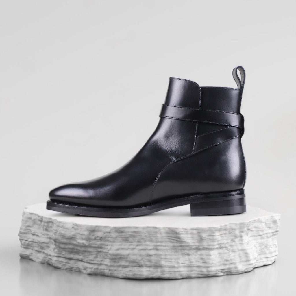 Leather jodhpur boots with buckled strap